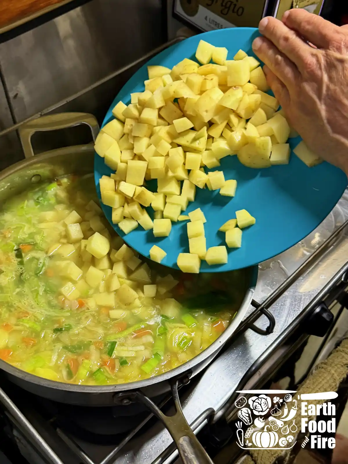 Adding potatoes to fish chowder