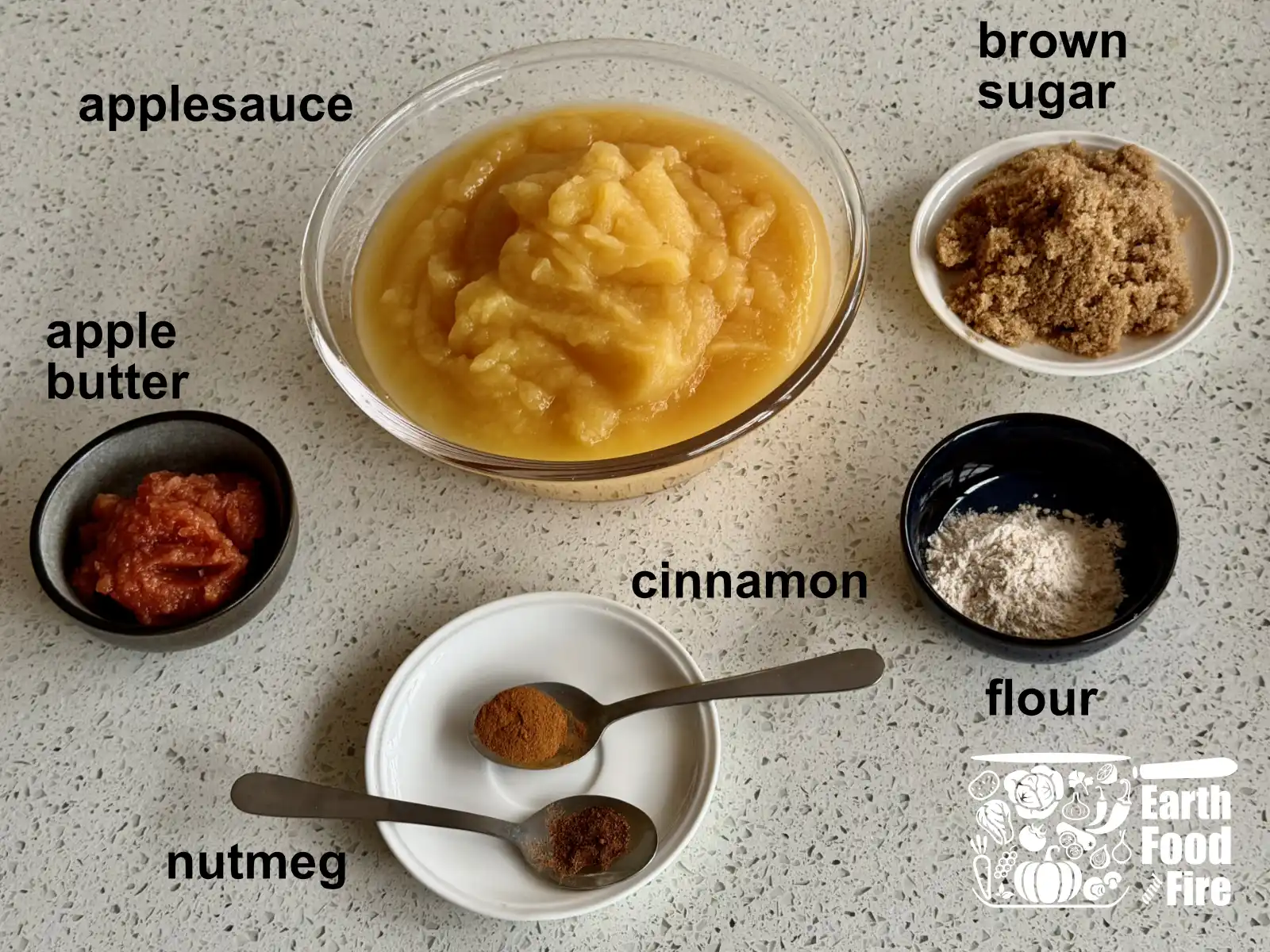 Applesauce crisp filling ingredients - unsweetened applesauce, brown sugar, all-purpose flour, homemade apple butter and spices - cinnamon and nutmeg.