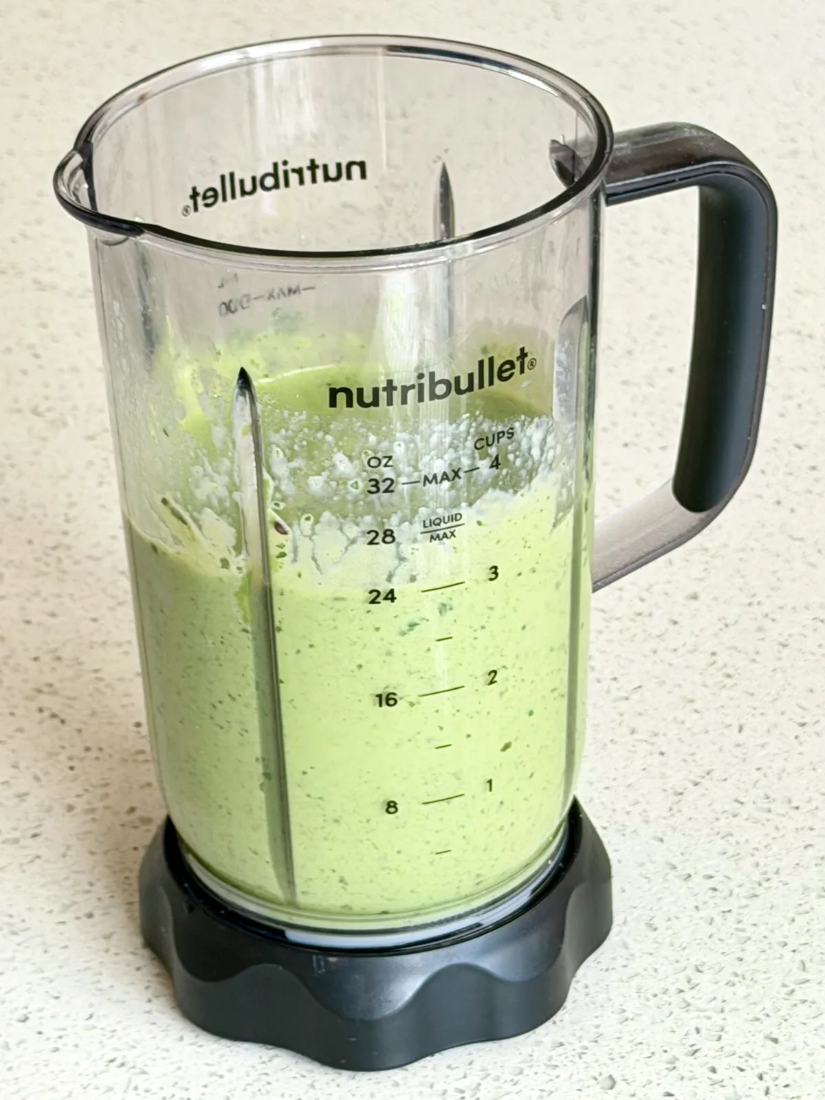Avocado smoothie ingredients blended in the blender