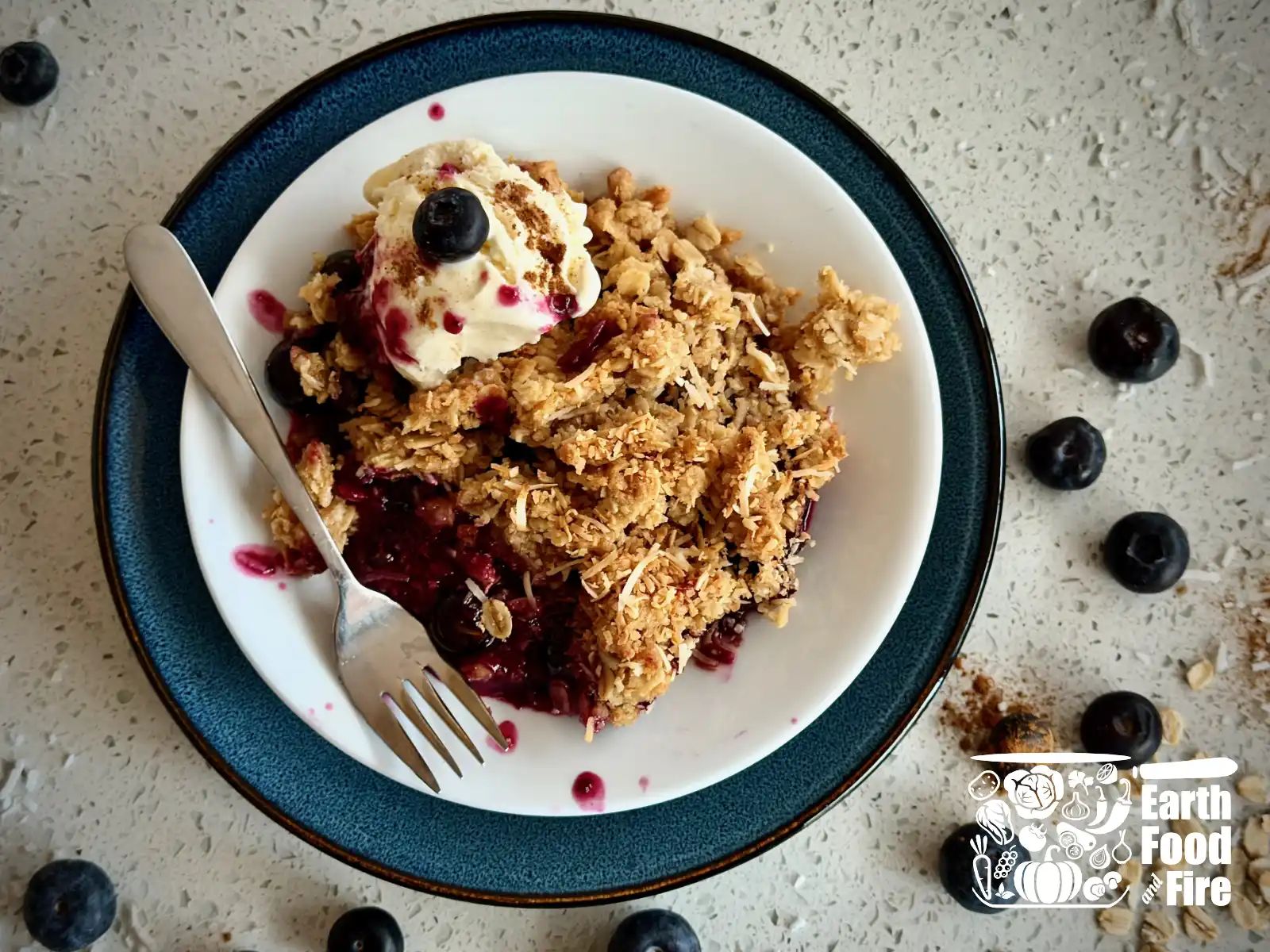 Blueberry crumble served with ice cream