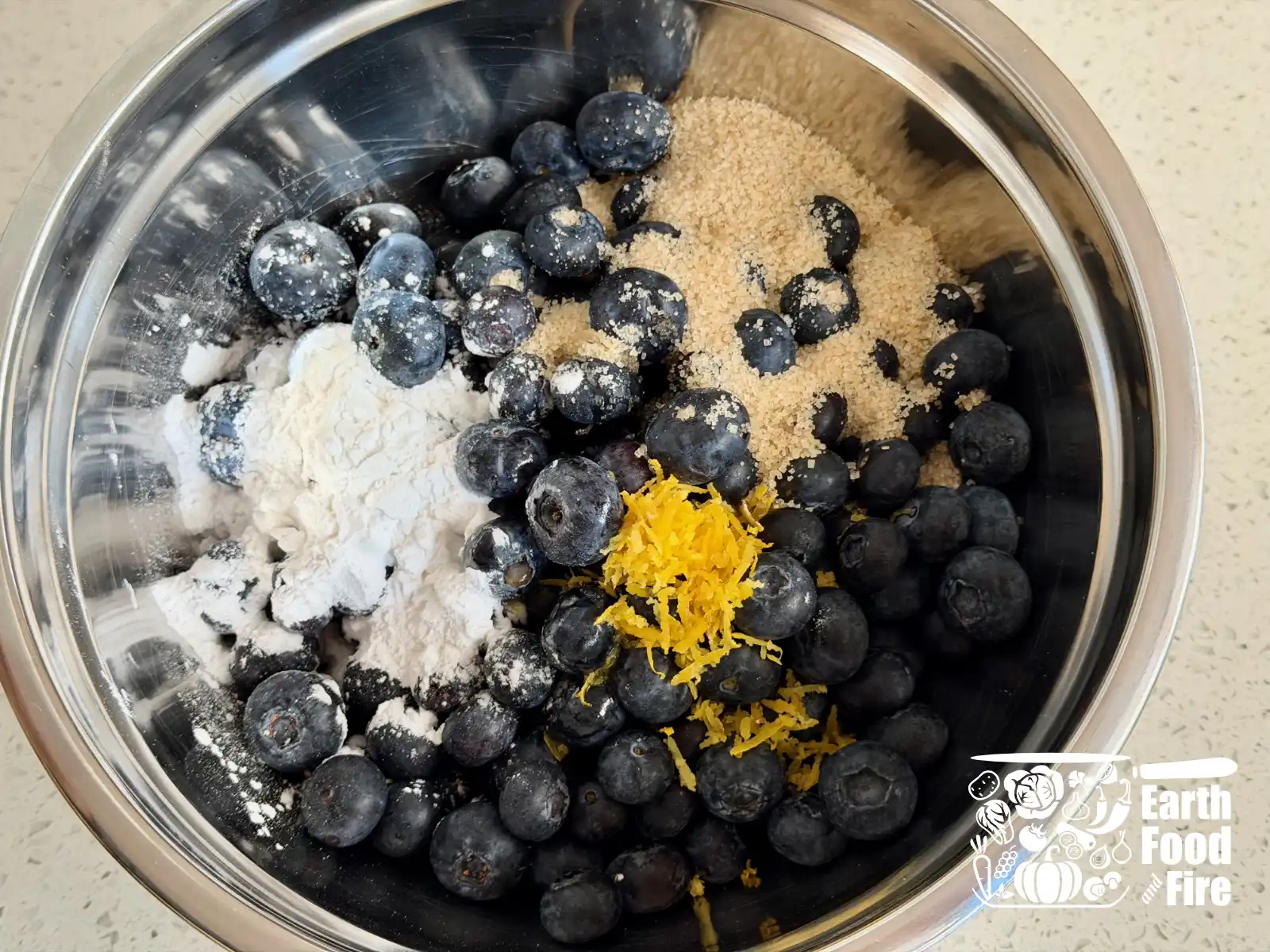 Blueberry filling ingredients ready to mix in a bowl
