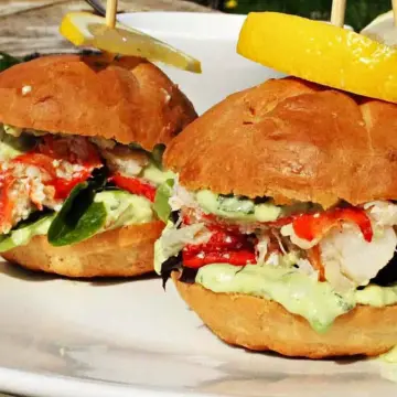 Close-up of lobster sliders showing all the bun fillings in detail