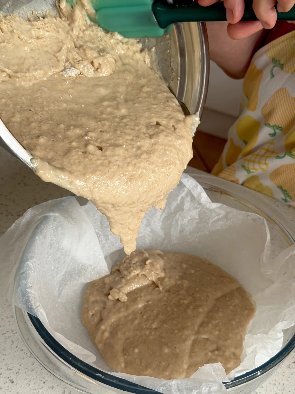 Pouring ingredients for vanilla cake into the baking pan for recipes for cakes