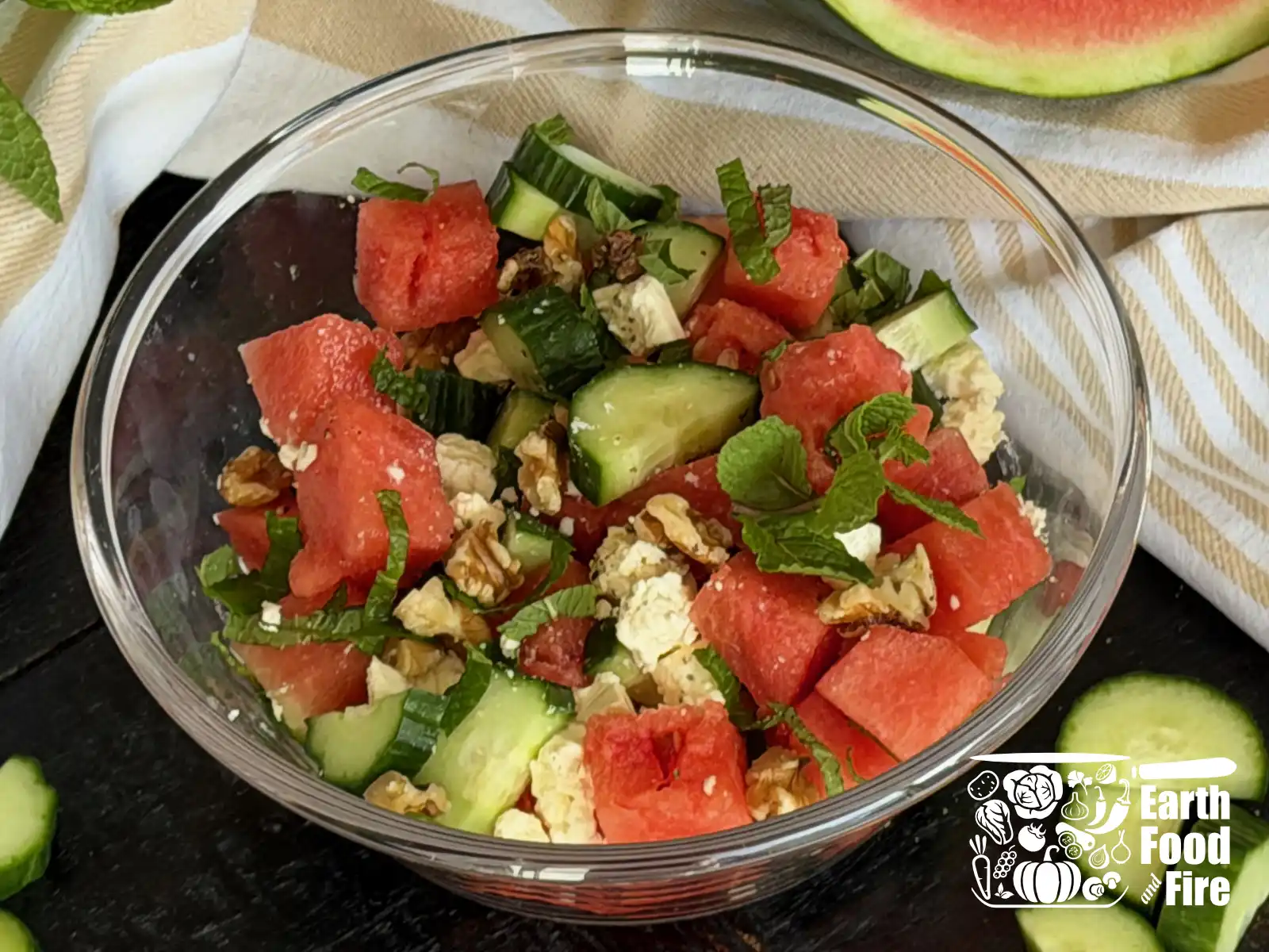 Roughly chopped feta cheese and watermelon salad in a glass bowl