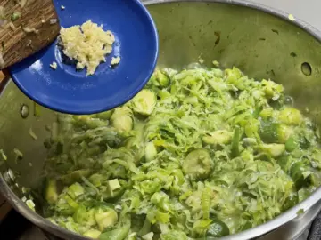 Adding minced garlic