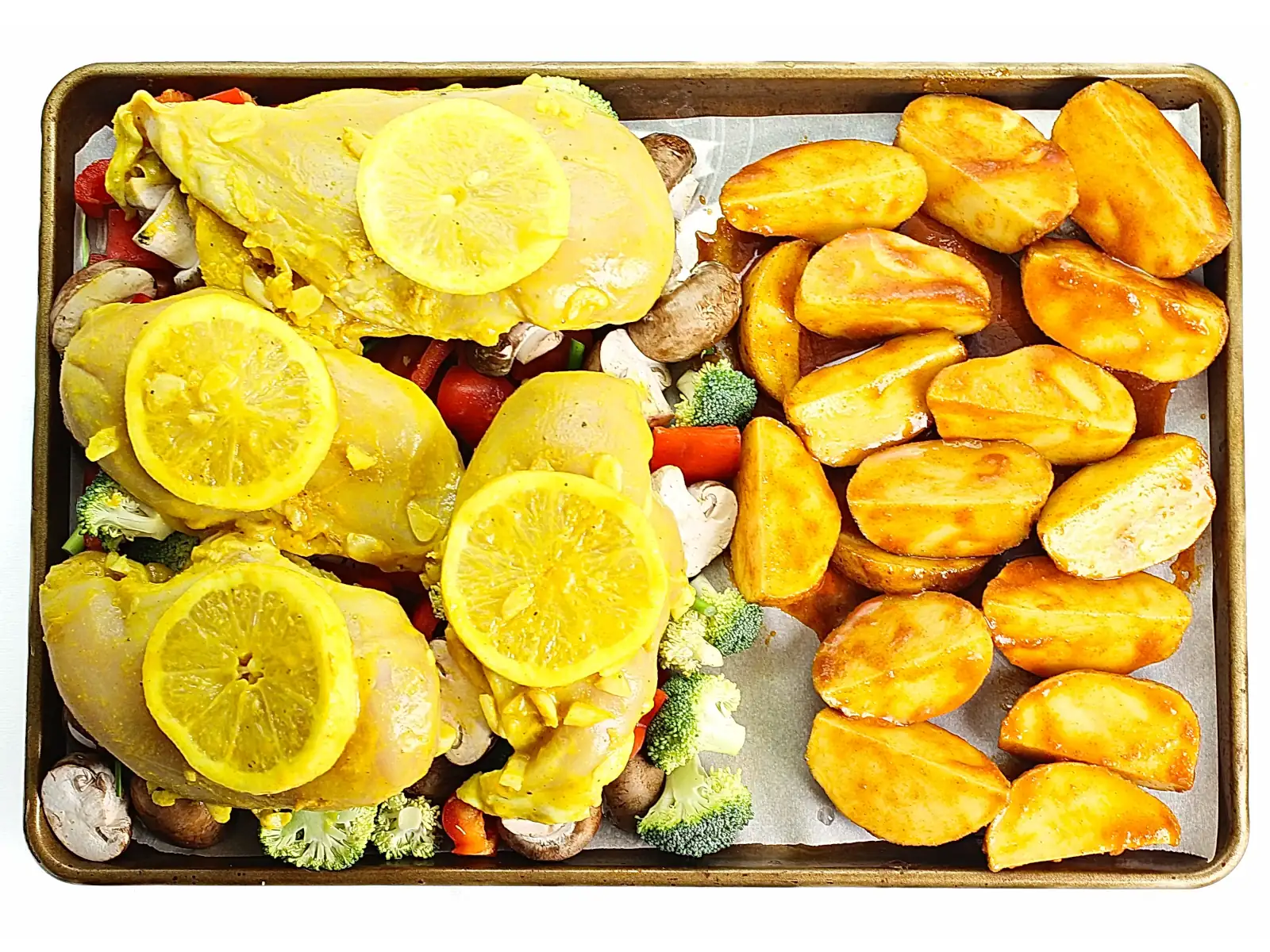Sheet pan with chicken, vegetables and potatoes