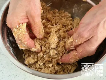 Blueberry crumble recipe - work the topping into crumbs